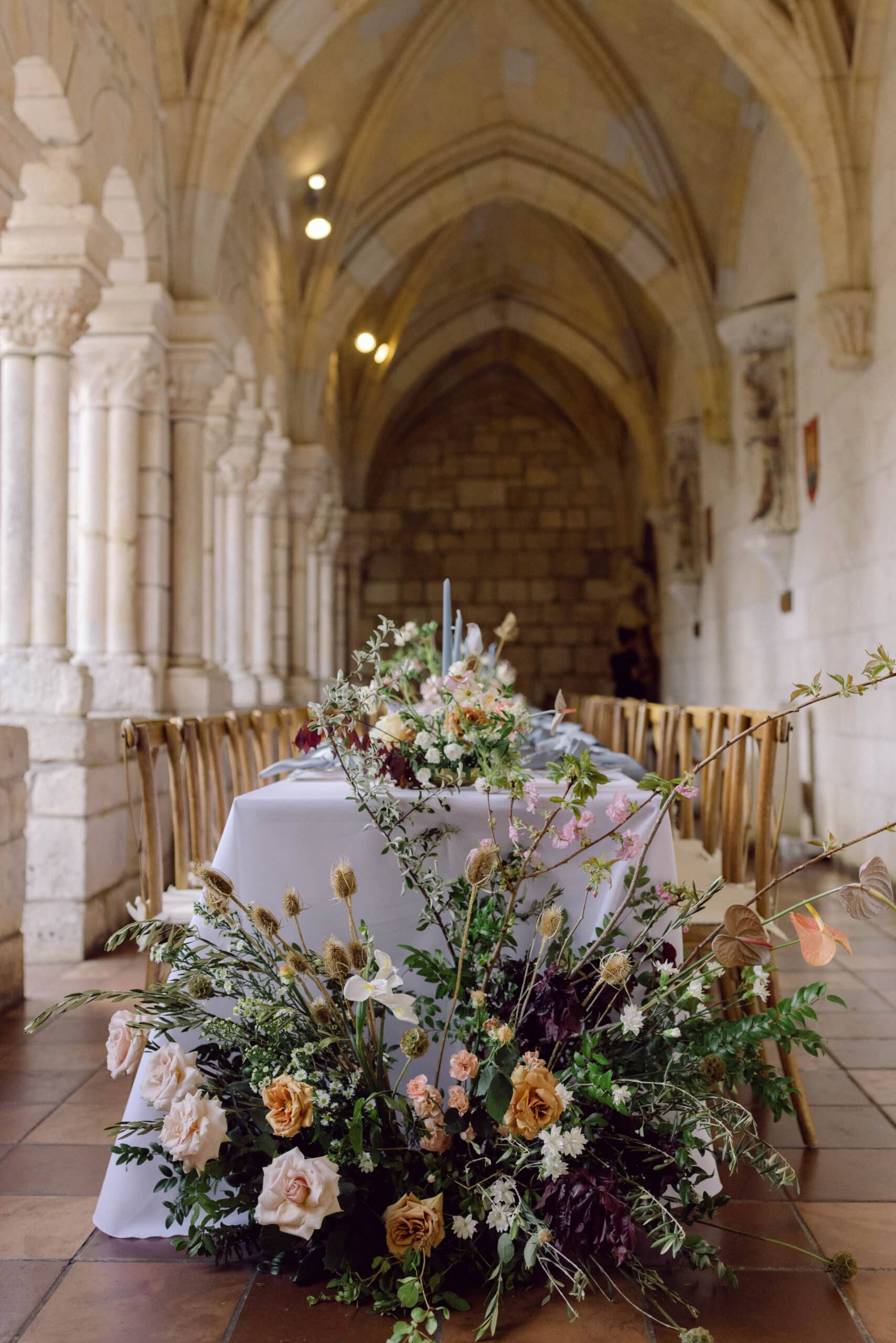 table end floral design wild and branchy at the spanish monastery.