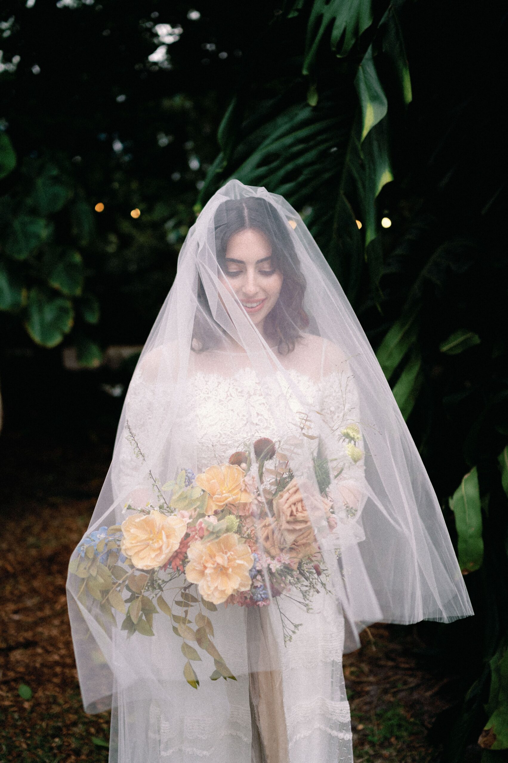 modern bride with a beautiful wedding bouquet at miami beach botanical