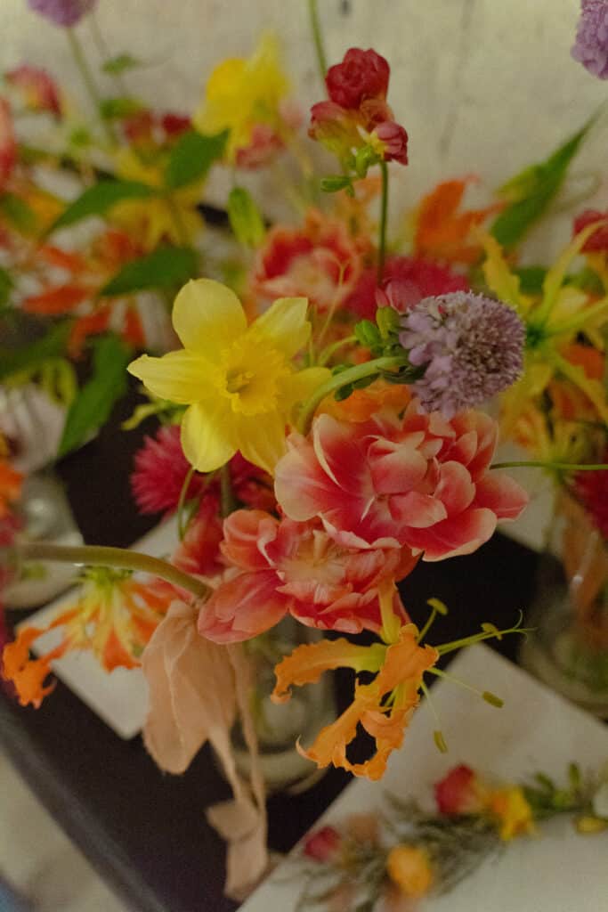 tropical wedding theme with vibrant floral decor