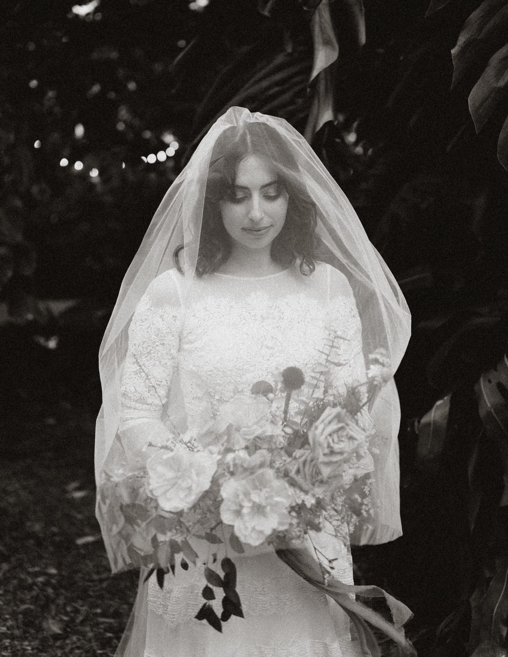 modern whimsical bride at miami beach botanical garden with her bride bouquet